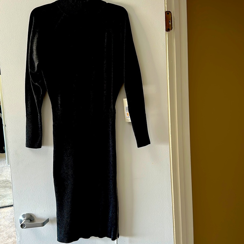 Eliza J sweater dress  mock turtle neck rib detail with functional side zip.
